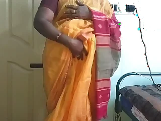 desi  indian horny tamil telugu kannada malayalam hindi cheating wife vanitha wearing orange colour saree  similar to one another big Bristols plus shaved pussy press unchanging Bristols press nip rubbing pussy masturbation