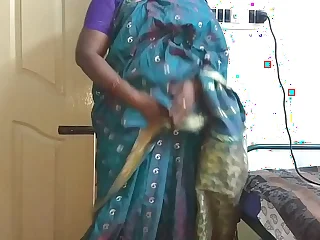 desi indian tamil telugu kannada malayalam hindi horny deviousness wife vanitha wearing blue colour saree showing big boobs and shaved pussy stir up hard boobs stir up chew rubbing pussy masturbation